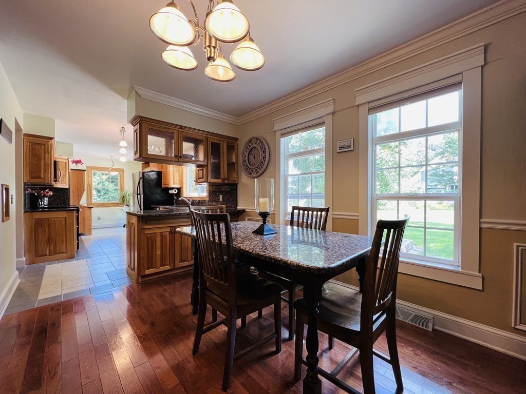3 Windmill Road Bourne, MA 02532 - Photo 8 of 42 a view of a dining room with furniture window and wooden floor