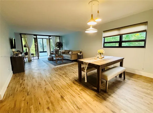 a kitchen with granite countertop a stove and a sink
