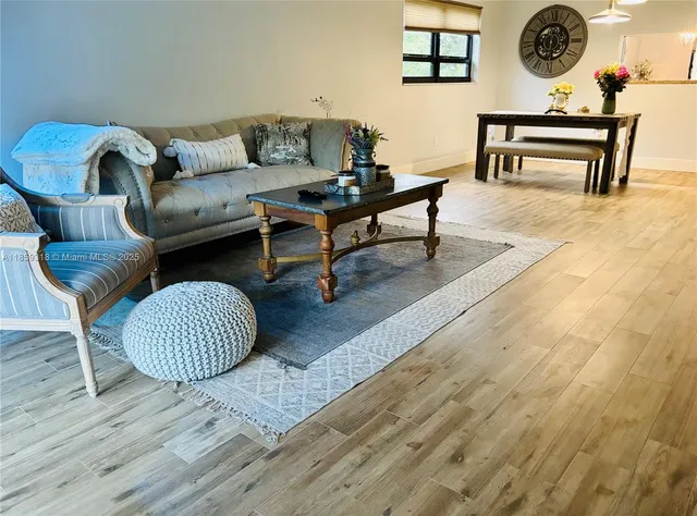 a view of a entryway with furniture and a window