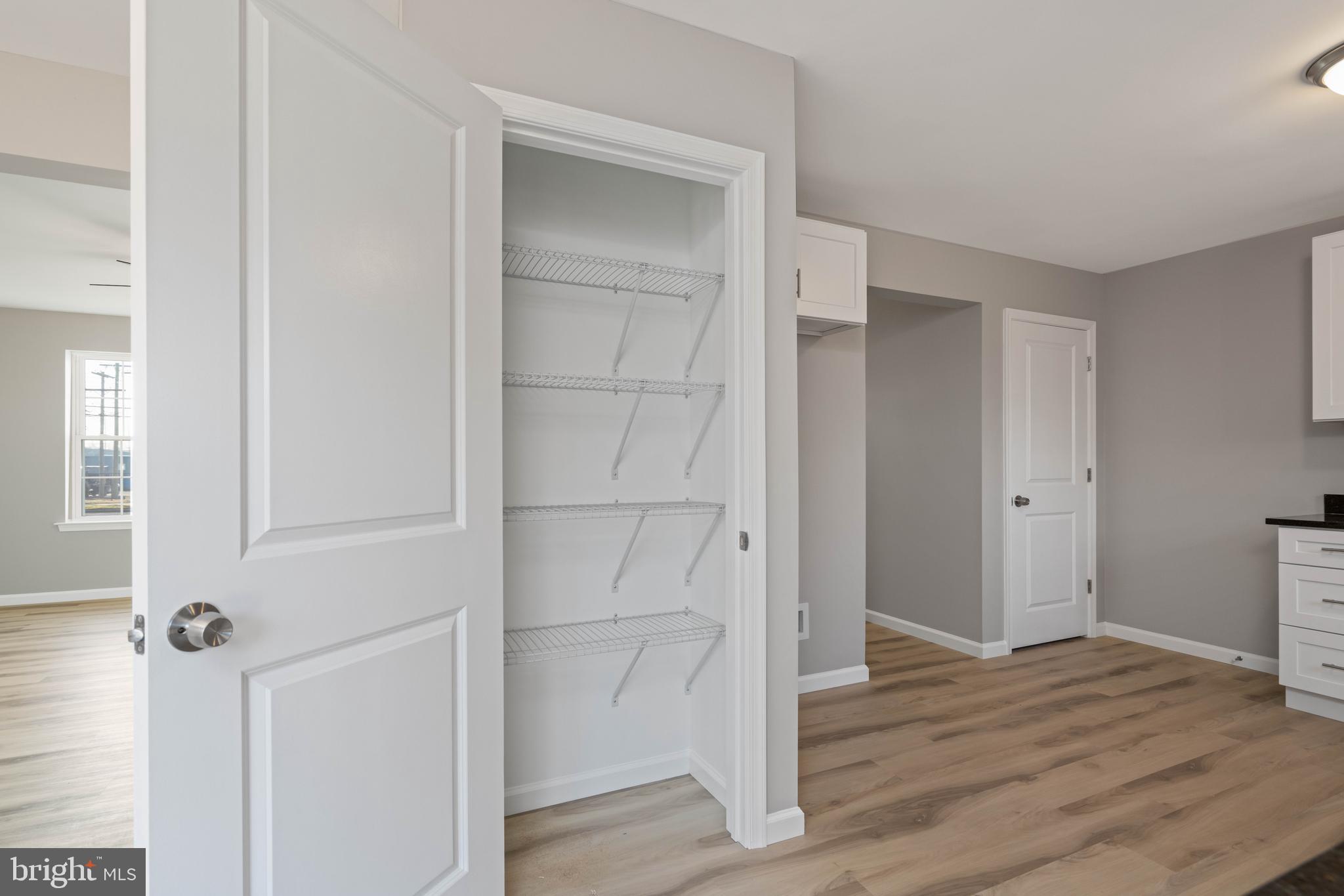 252 Stanger Avenue Glassboro, NJ 08028 - Photo 11 of 27 a view of empty room with wooden floor