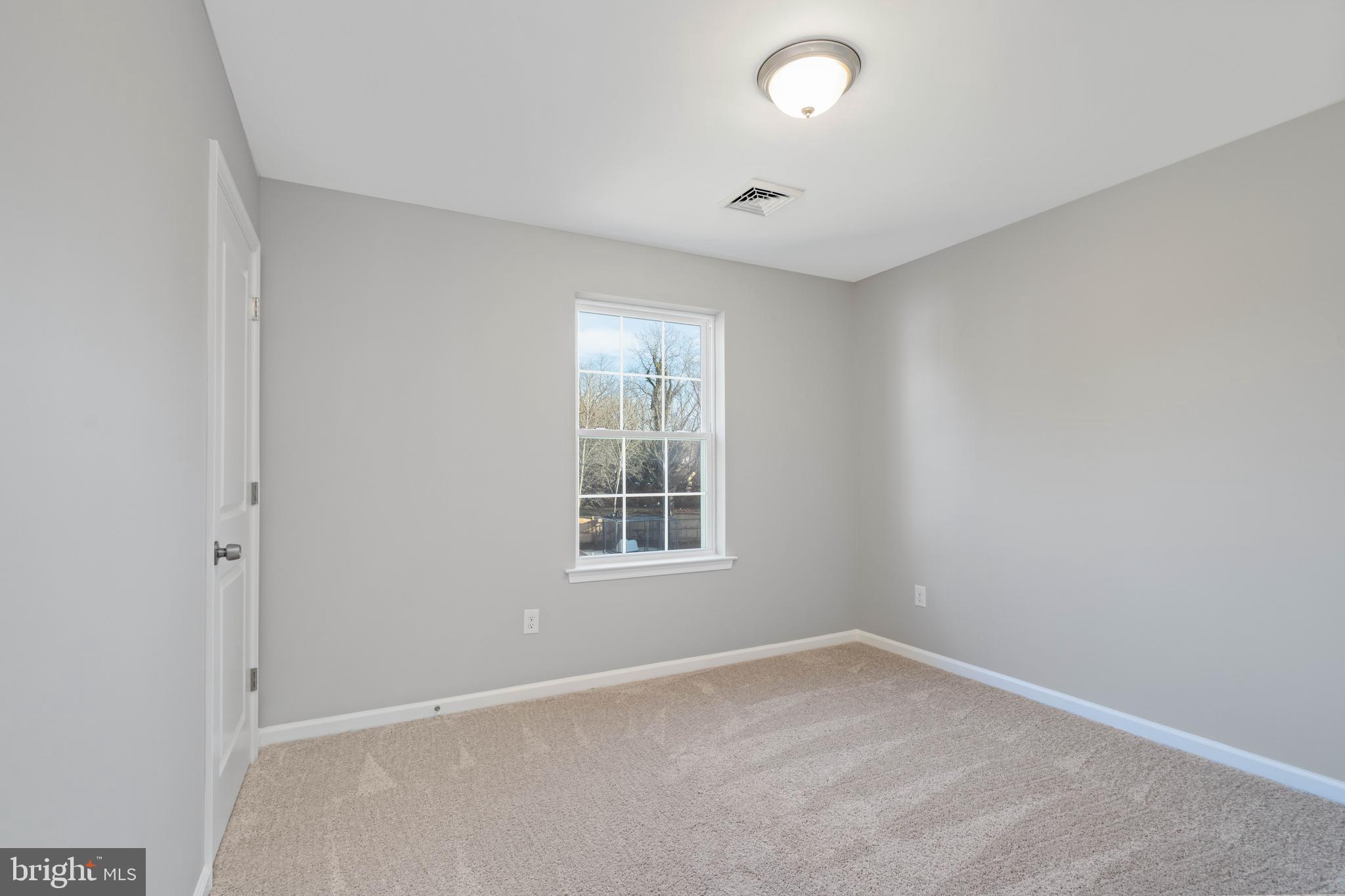 252 Stanger Avenue Glassboro, NJ 08028 - Photo 18 of 27 an empty room with a window