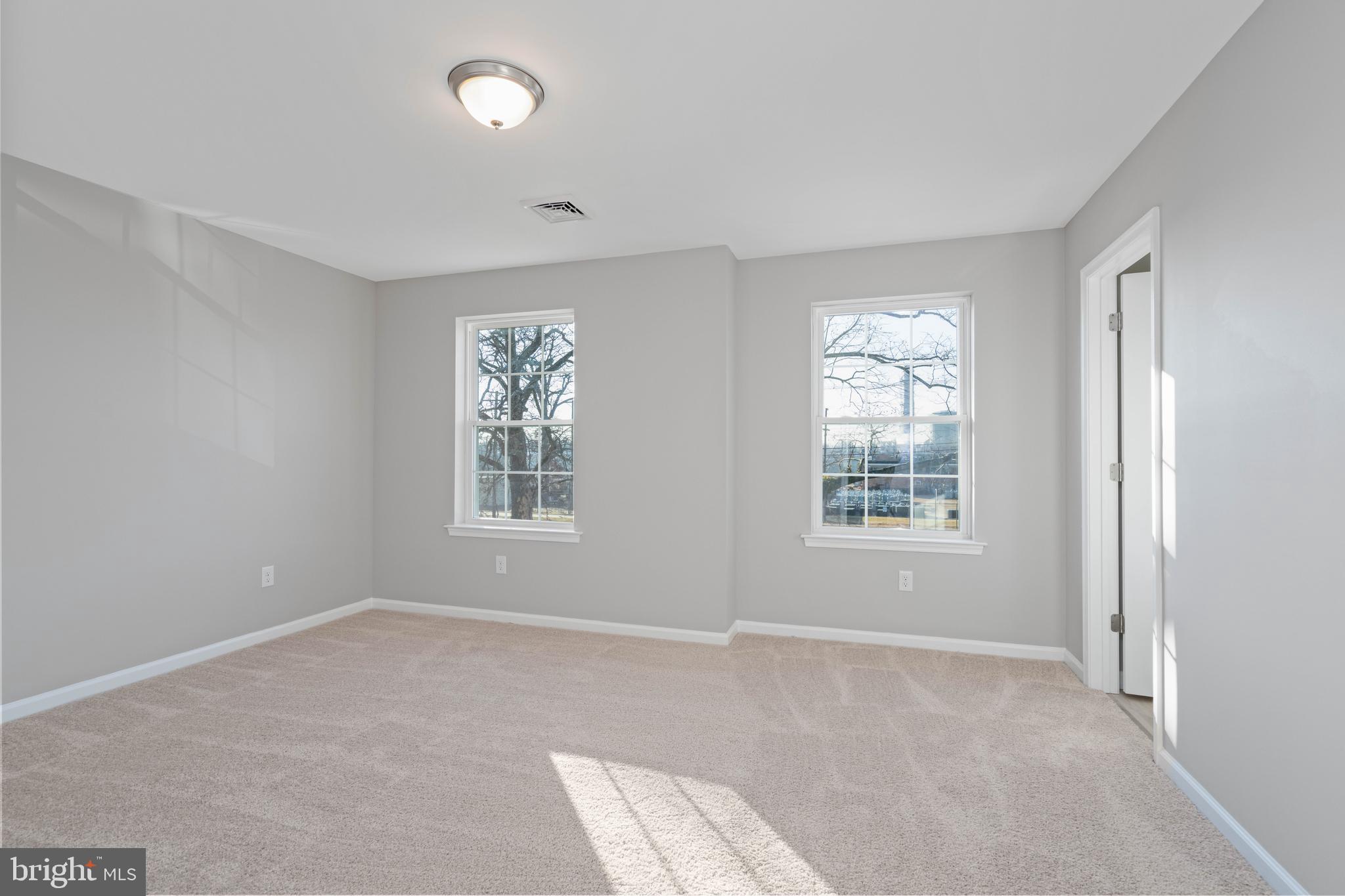 252 Stanger Avenue Glassboro, NJ 08028 - Photo 20 of 27 a view of an empty room with a window