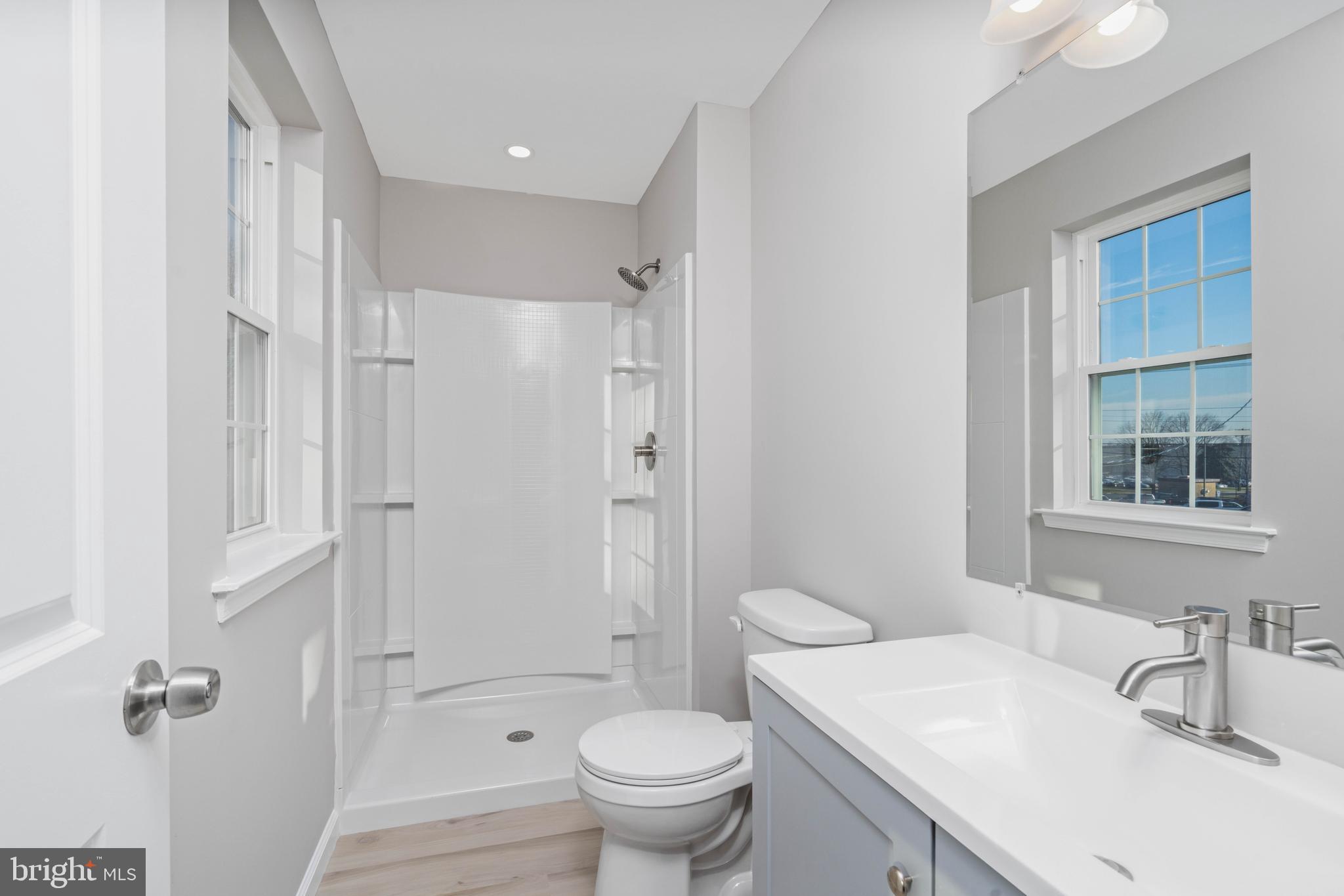 252 Stanger Avenue Glassboro, NJ 08028 - Photo 22 of 27 a bathroom with a sink toilet tub and shower