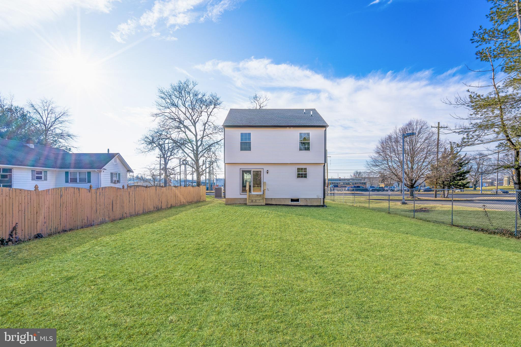 252 Stanger Avenue Glassboro, NJ 08028 - Photo 26 of 27 a view of a house with a big yard and large trees