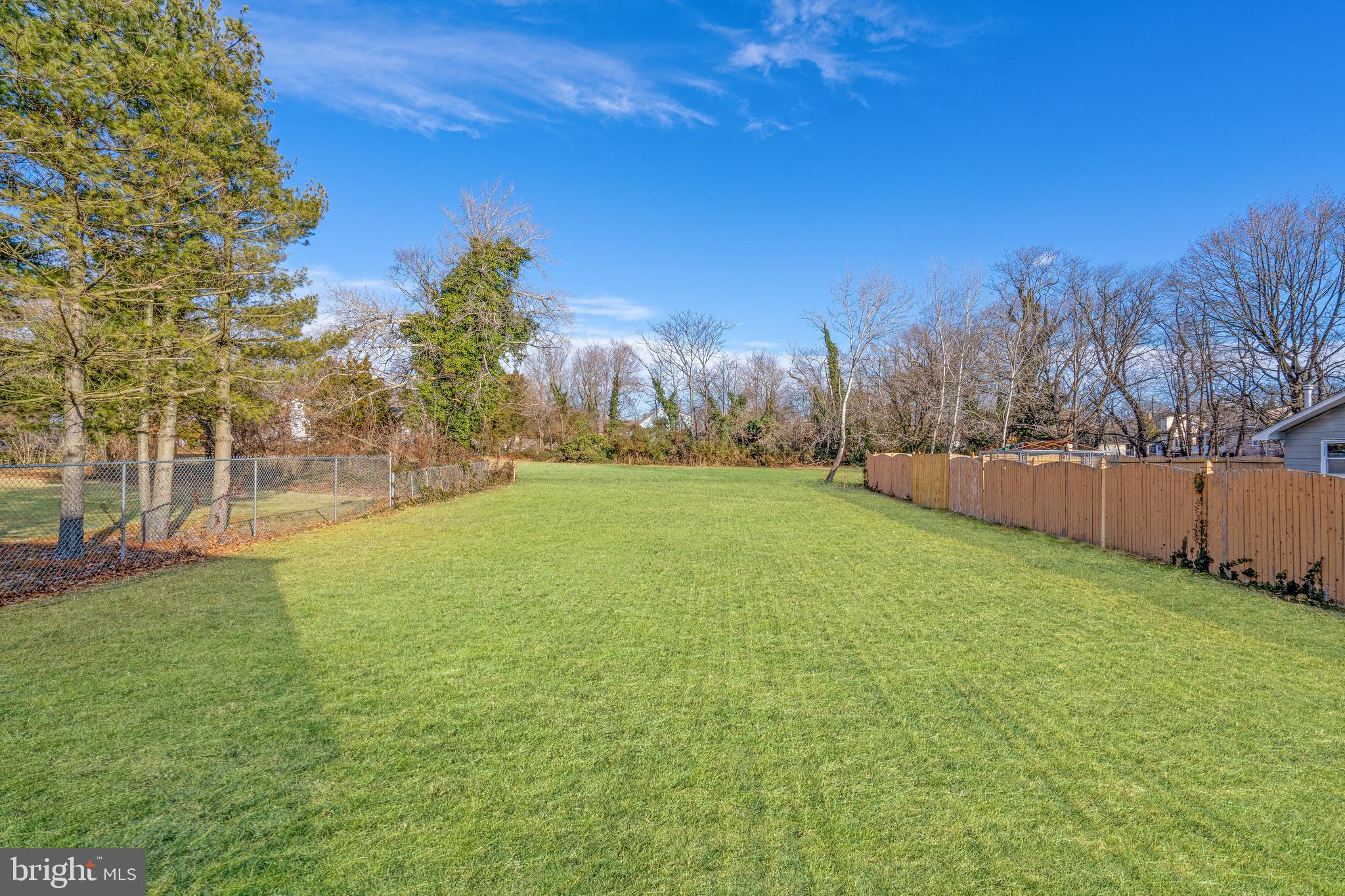 252 Stanger Avenue Glassboro, NJ 08028 - Photo 27 of 27 a view of yard with swimming pool and green space