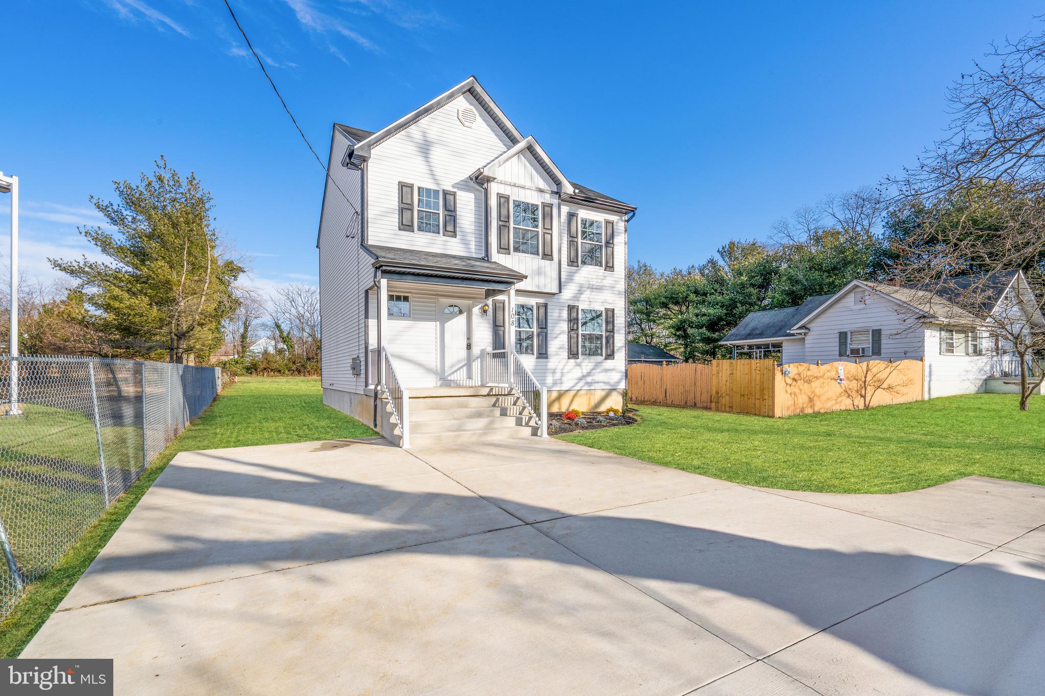 252 Stanger Avenue Glassboro, NJ 08028 - Photo 3 of 27 a front view of a house with a yard and porch