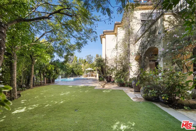 a view of entryway and hall with a dining room