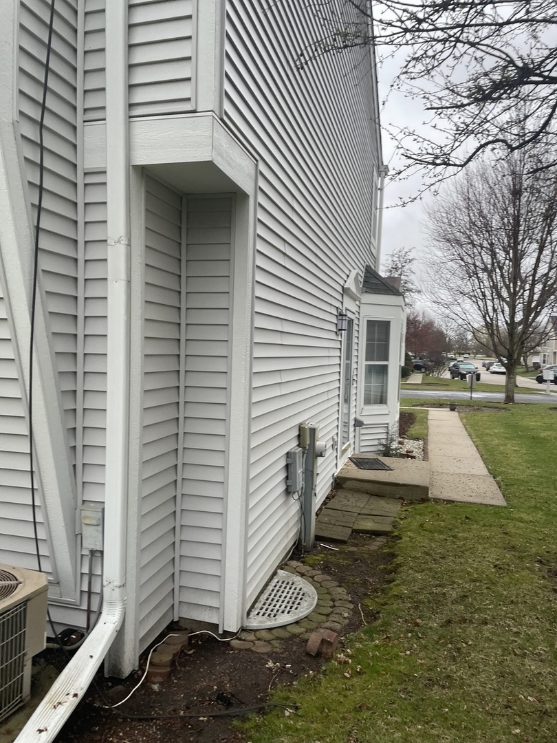 498 Nicole Drive, Unit A Bartlett, IL 60103 - Photo 2 of 7 a view of a patio with a yard