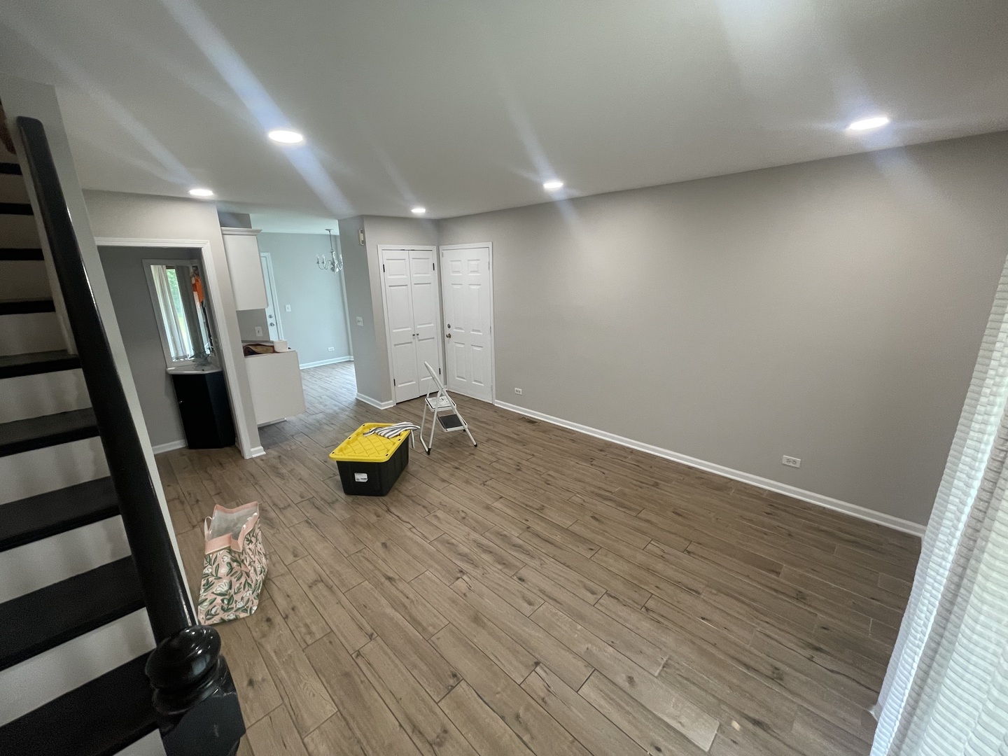 498 Nicole Drive, Unit A Bartlett, IL 60103 - Photo 4 of 7 a view of living room with wooden floor and furniture