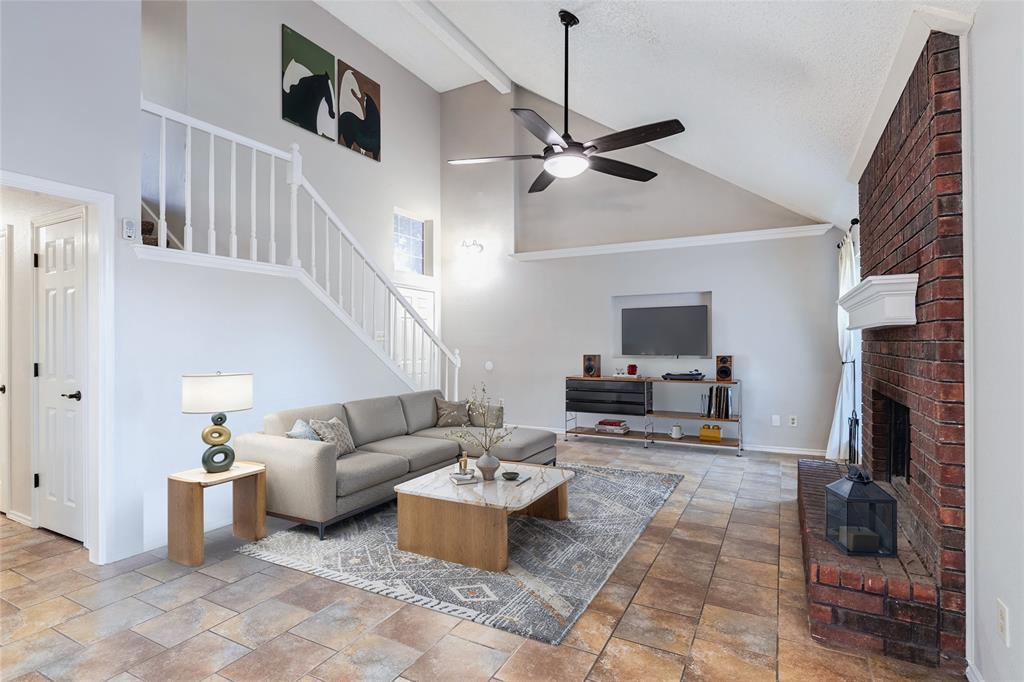 2123 Ridgecliff Drive Keller, TX 76248 - Photo 6 of 19 a living room with furniture and a fireplace