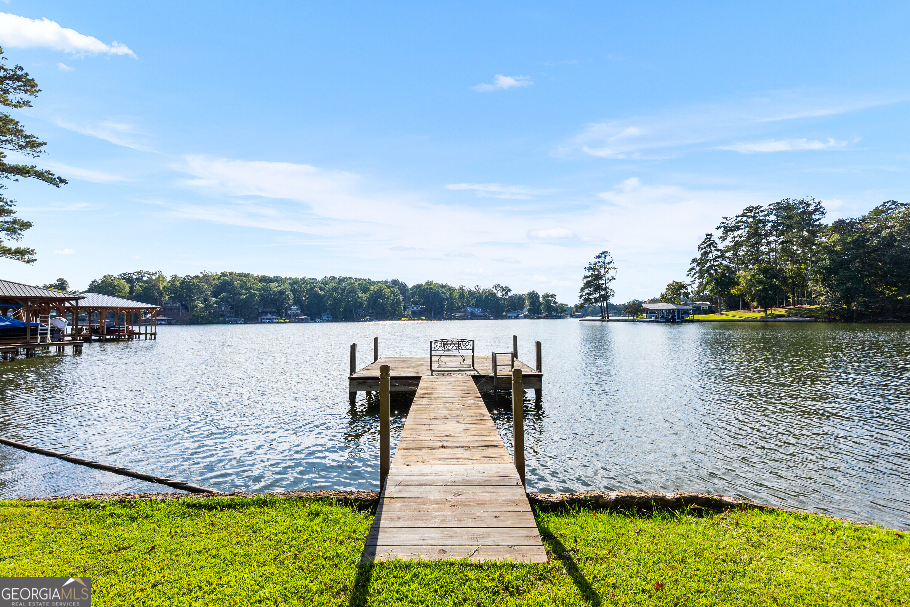 324 Blenny Run Jackson, GA 30233 - Photo 3 of 71 a view of a lake with houses