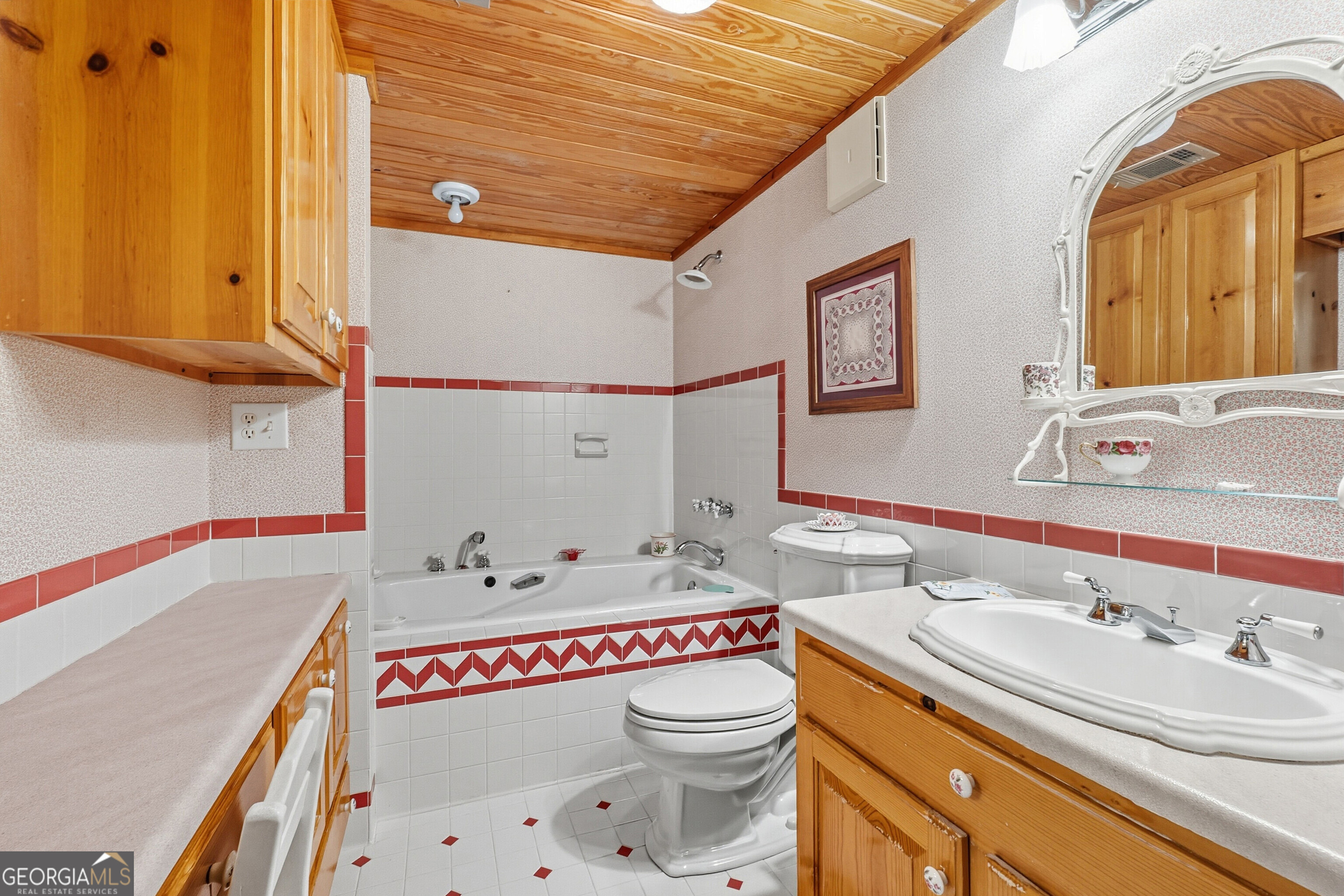 324 Blenny Run Jackson, GA 30233 - Photo 34 of 71 a bathroom with a sink mirror vanity and toilet