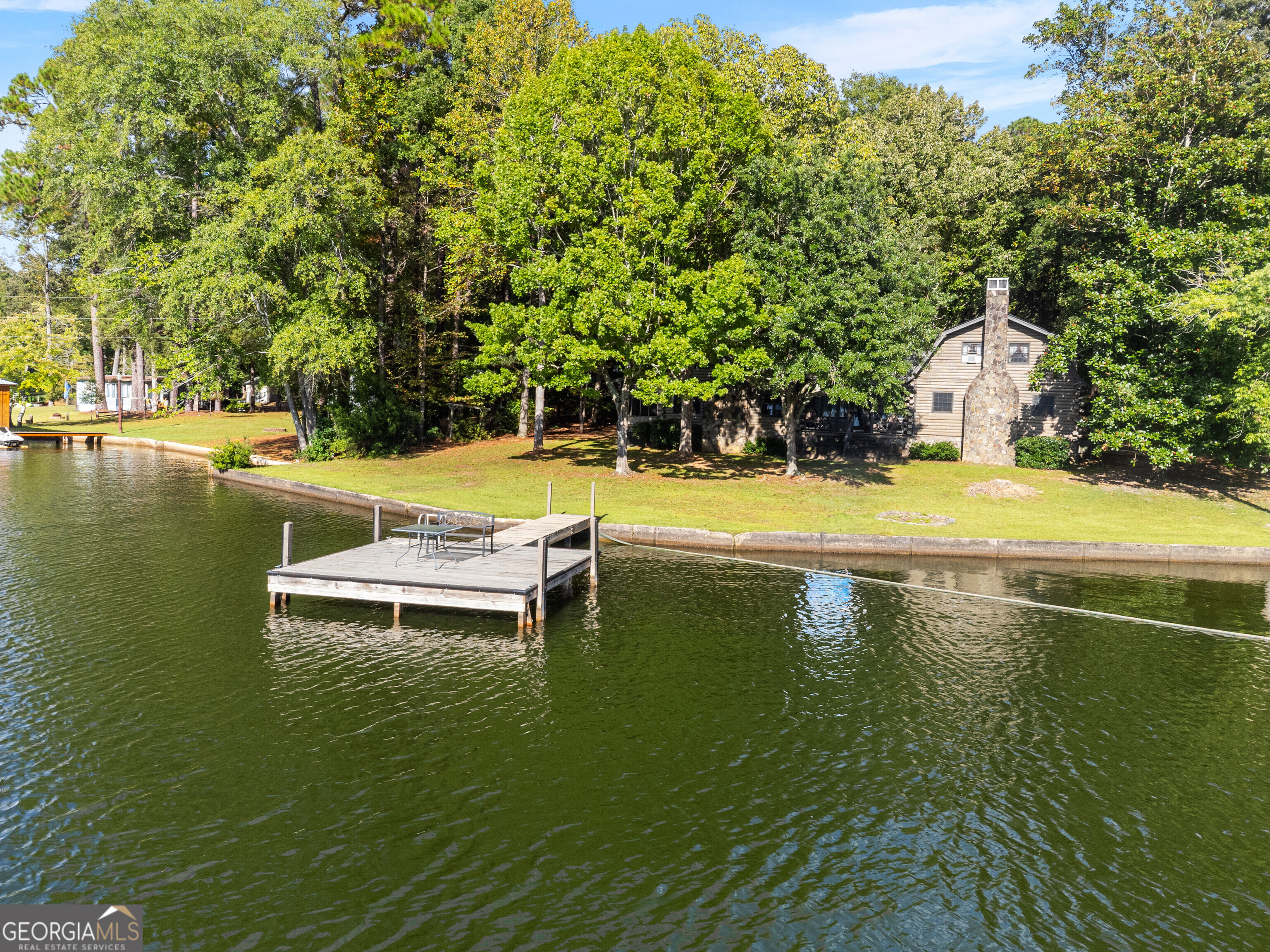 324 Blenny Run Jackson, GA 30233 - Photo 5 of 71 a view of a swimming pool with an ocean view