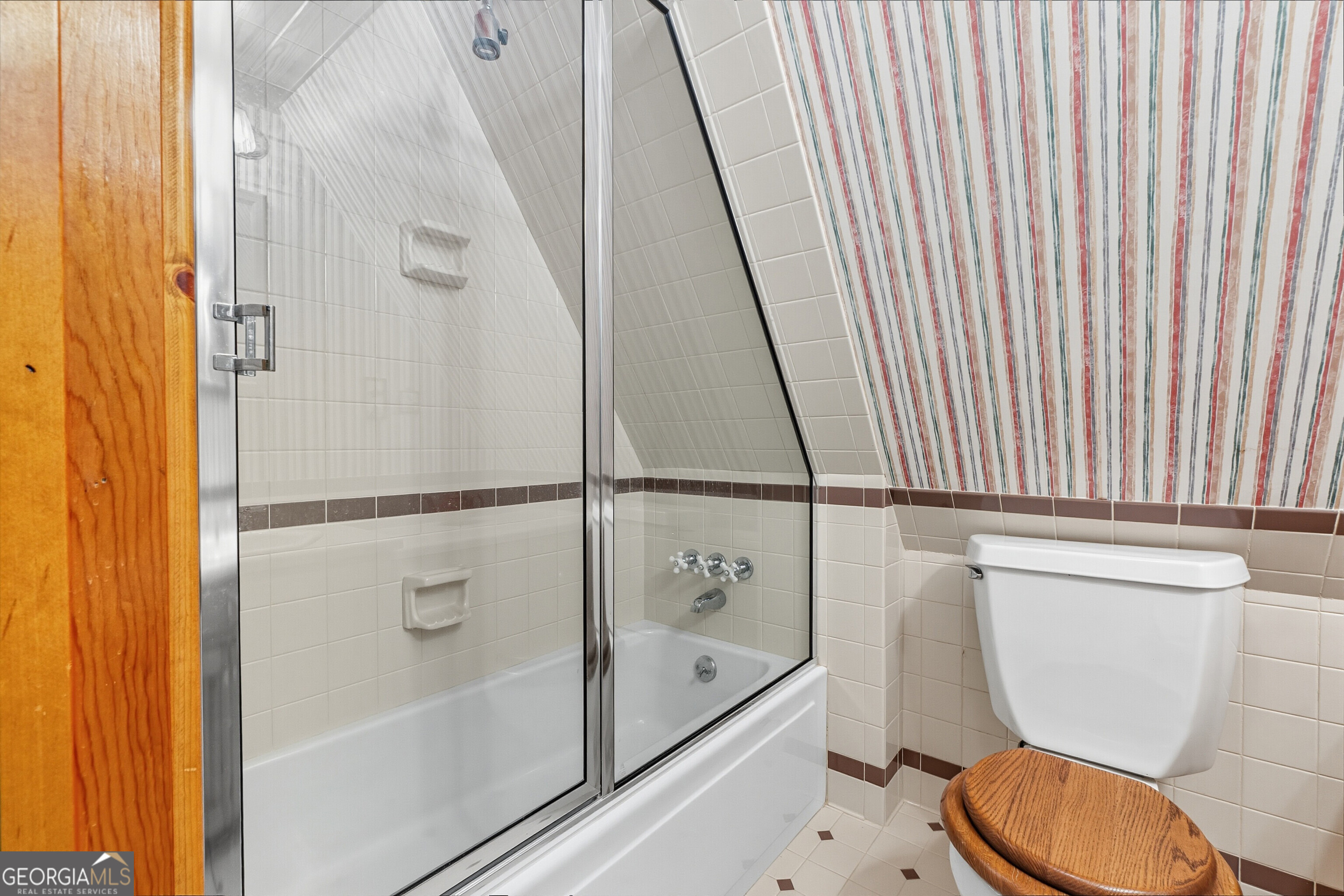 324 Blenny Run Jackson, GA 30233 - Photo 60 of 71 a bathroom with a toilet and a shower