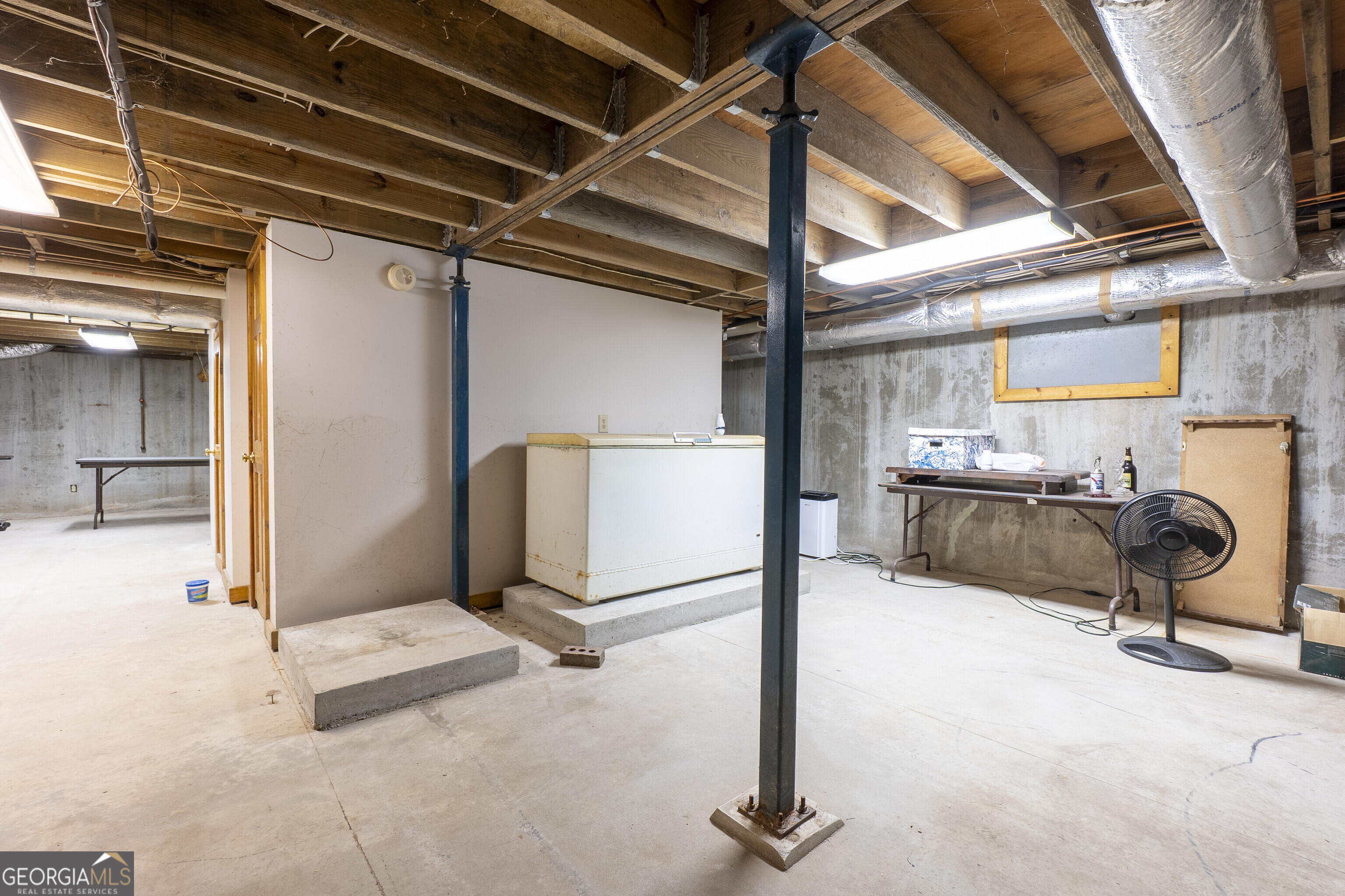 324 Blenny Run Jackson, GA 30233 - Photo 65 of 71 a view of a room with gym equipment