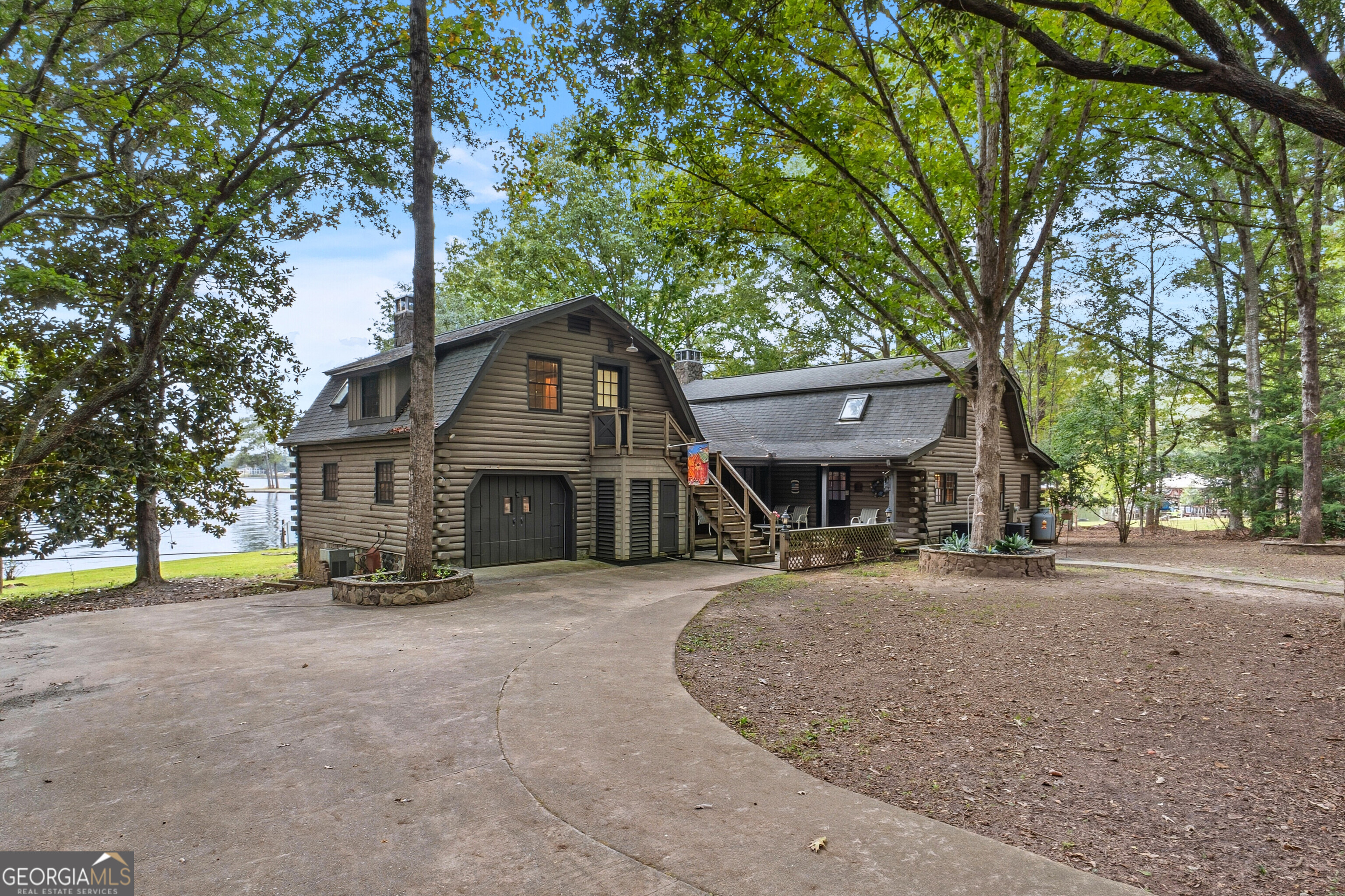 324 Blenny Run Jackson, GA 30233 - Photo 7 of 71 a front view of a house with a garden