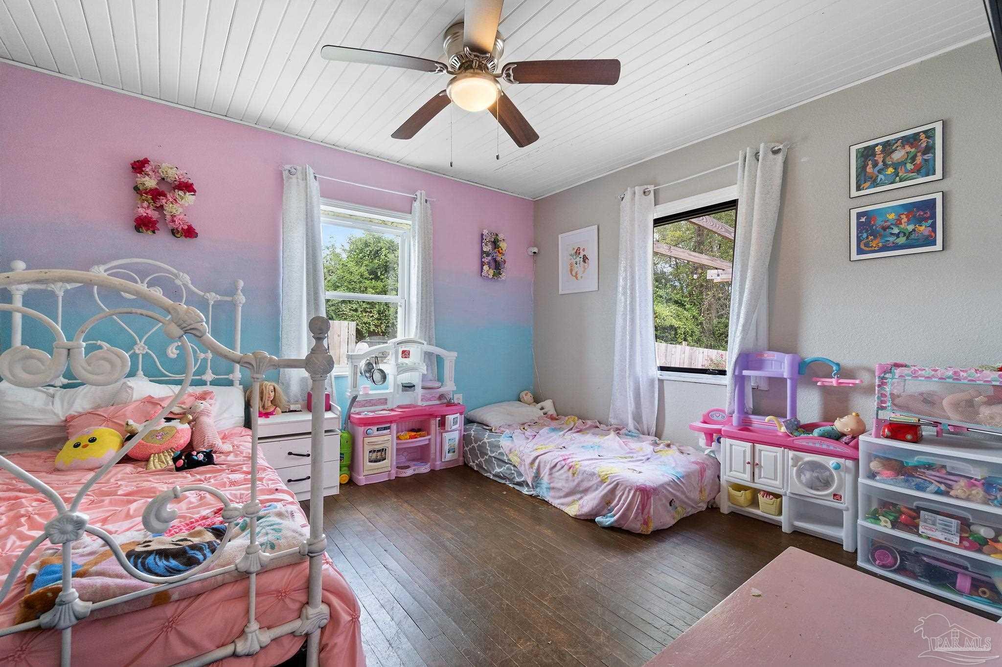 10610 Chemstrand Road Pensacola, FL 32514 - Photo 17 of 42 a bedroom with bed and a window