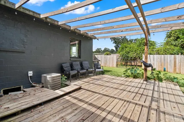 a backyard of a house with seating space
