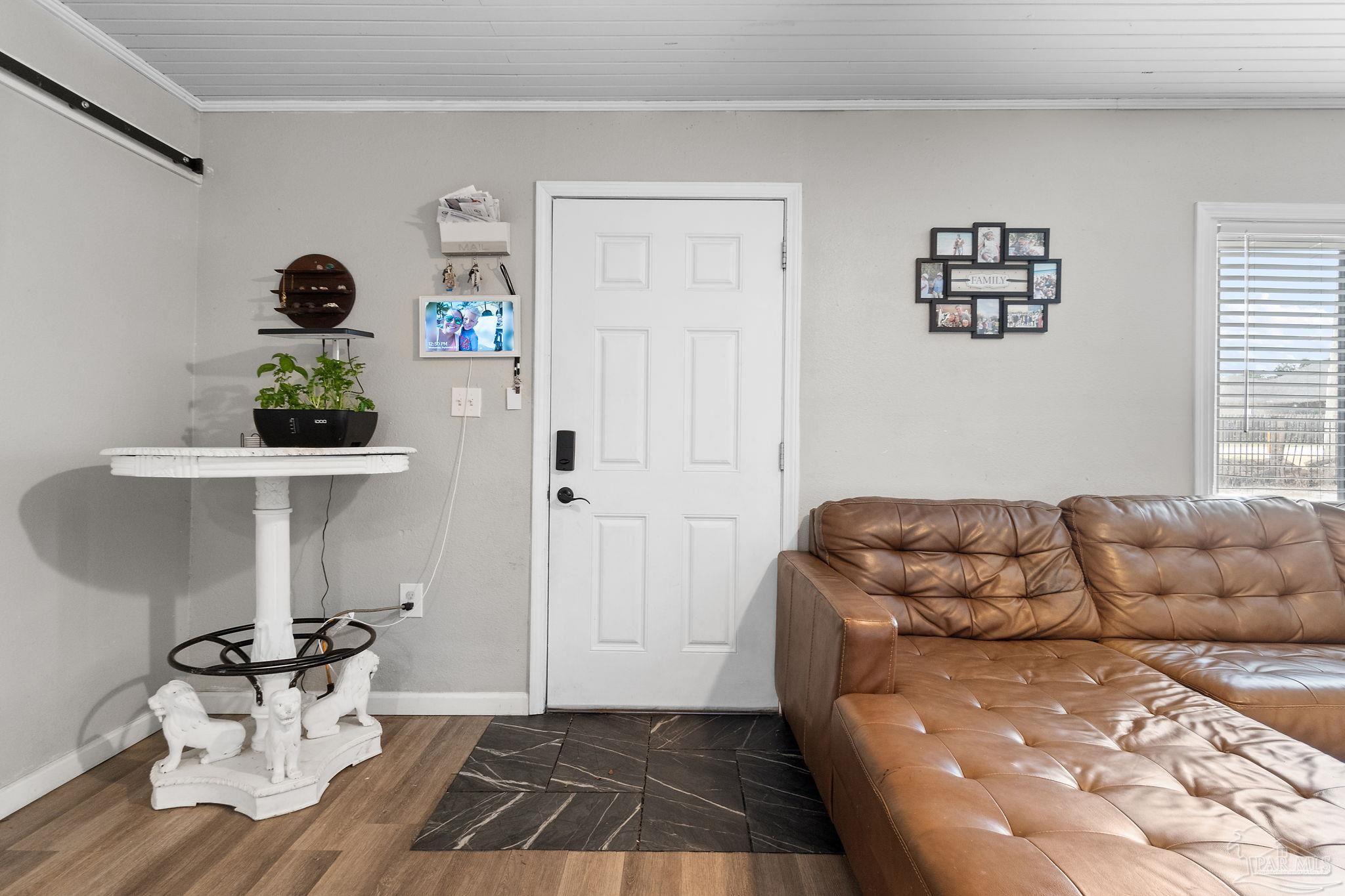 10610 Chemstrand Road Pensacola, FL 32514 - Photo 5 of 42 a living room with furniture and a window