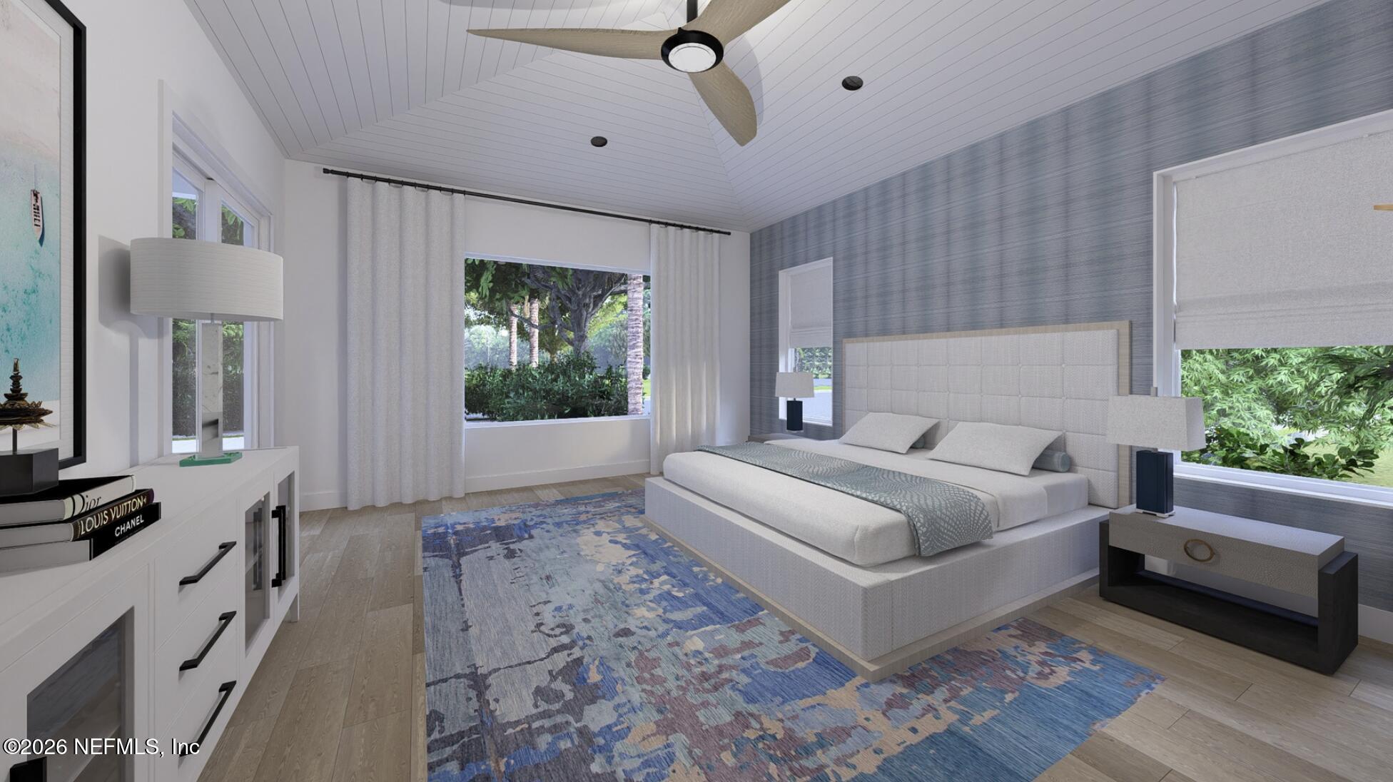362 19th Street Atlantic Beach, FL 32233 - Photo 4 of 7 a spacious bedroom with a large bed and a window