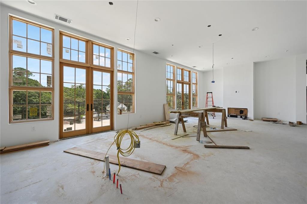 8200 Main Street, Unit 1306 Woodstock, GA 30188 - Photo 11 of 43 a building with glass windows