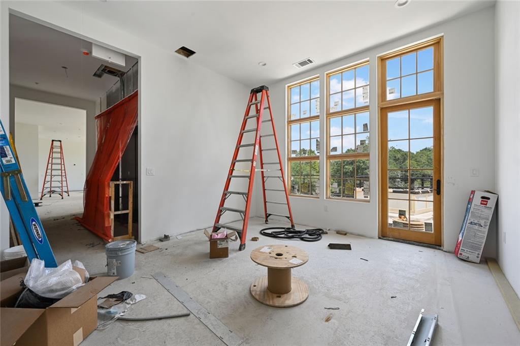 8200 Main Street, Unit 1306 Woodstock, GA 30188 - Photo 15 of 43 a view of a living room and a large window