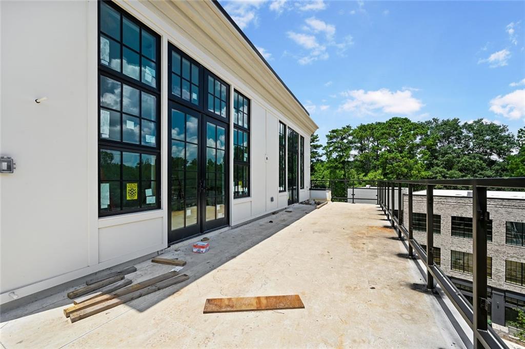 8200 Main Street, Unit 1306 Woodstock, GA 30188 - Photo 26 of 43 a balcony with view of swimming pool