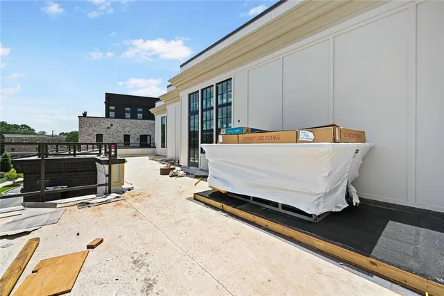 a view of swimming pool with seating area
