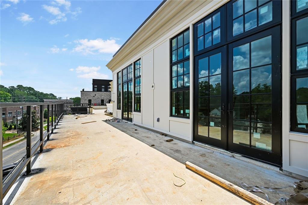 8200 Main Street, Unit 1306 Woodstock, GA 30188 - Photo 28 of 43 a view of swimming pool with seating area