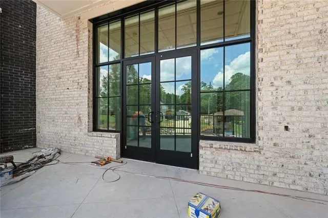 a room with window and furniture