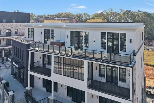 an aerial view of a balcony with city view
