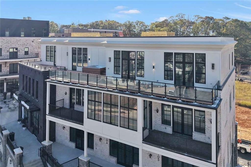 8200 Main Street, Unit 1306 Woodstock, GA 30188 - Photo 3 of 43 an aerial view of a balcony with city view