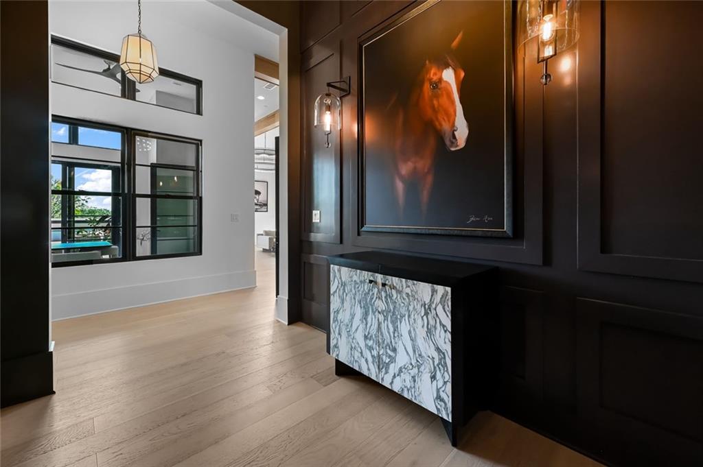 8200 Main Street, Unit 1306 Woodstock, GA 30188 - Photo 33 of 43 a view of an entryway with wooden floor