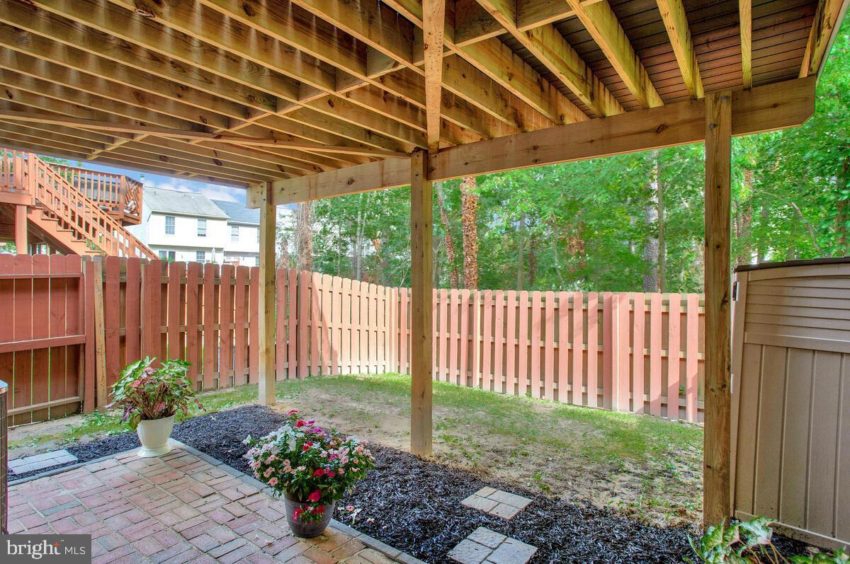 2209 Commissary Circle, Unit 284 Odenton, MD 21113 - Photo 5 of 9 a garden view with a seating space