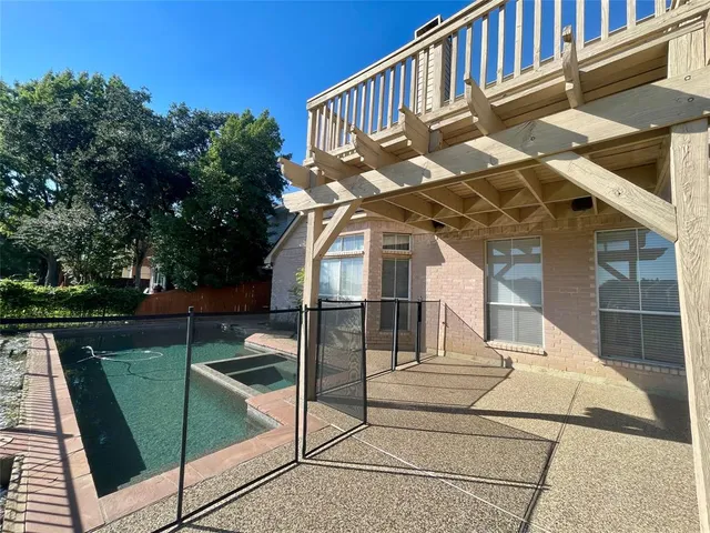 a view of a chair and table on the terrace