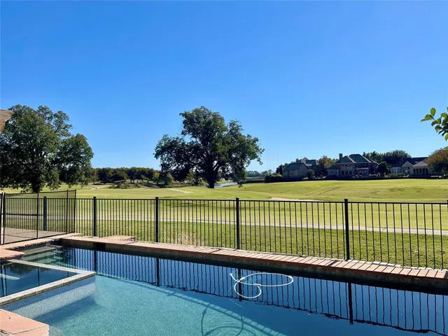 a view of outdoor space with a lake view