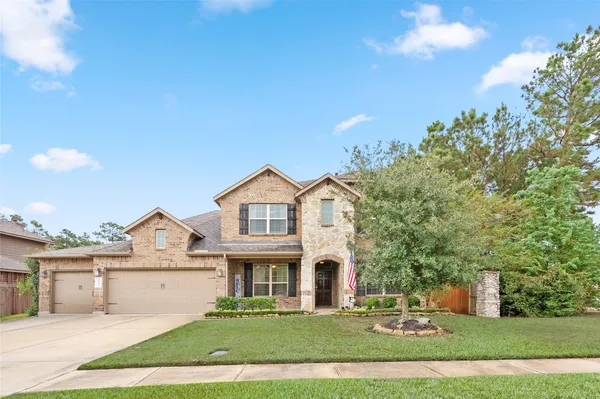 $555,000 | 14104 North Crater Lake Court, Conroe, TX 77384