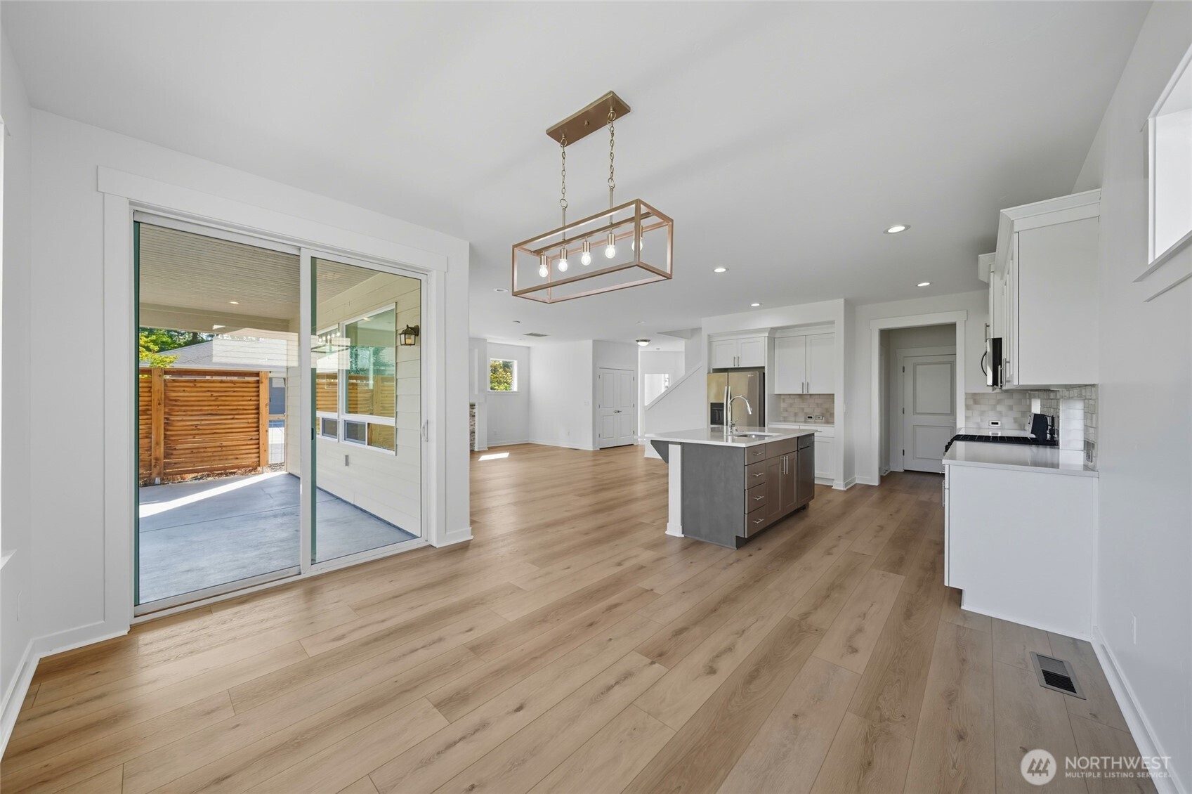 476 Reserve Way Walla Walla, WA 99362 - Photo 12 of 40 a view of a kitchen with a sink a counter space and stainless steel appliances