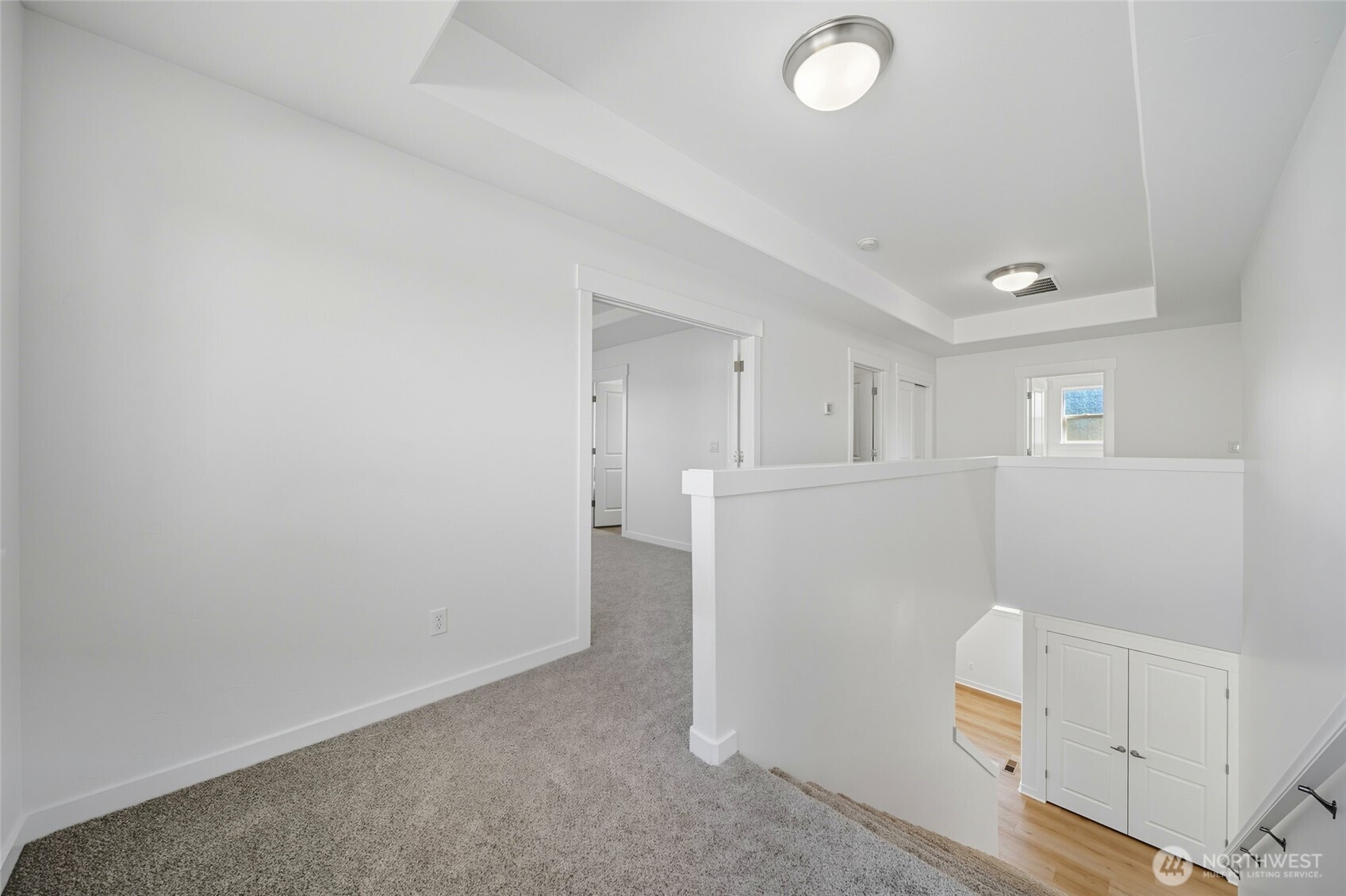 476 Reserve Way Walla Walla, WA 99362 - Photo 16 of 40 a view of a kitchen with refrigerator and white cabinets
