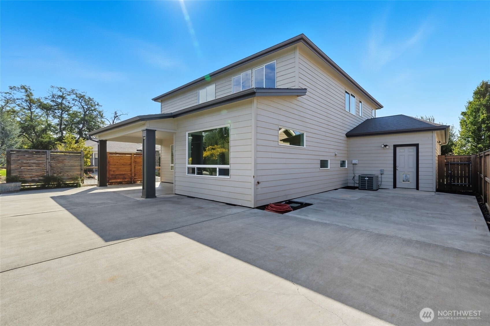 476 Reserve Way Walla Walla, WA 99362 - Photo 35 of 40 a view of a house with backyard and a garage
