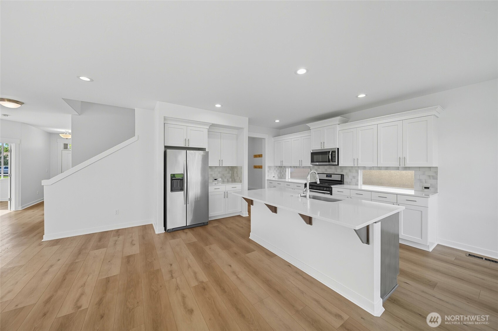 476 Reserve Way Walla Walla, WA 99362 - Photo 9 of 40 a view of kitchen with stainless steel appliances refrigerator stove microwave and cabinets
