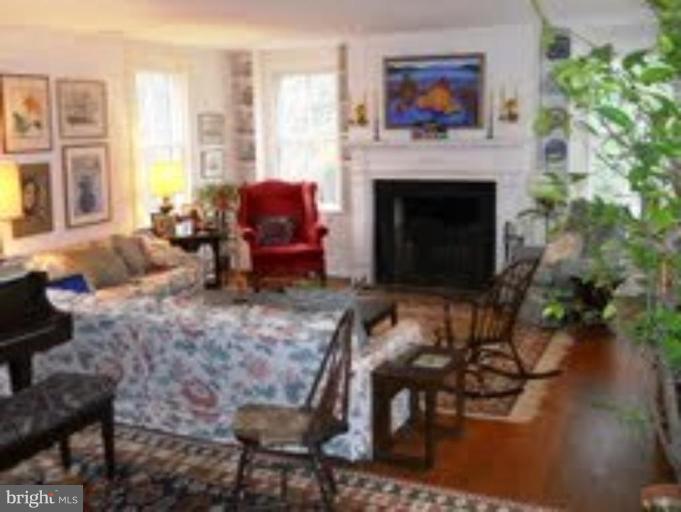 16429 Falls Road Upperco, MD 21155 - Photo 14 of 23 a living room with furniture and a fireplace