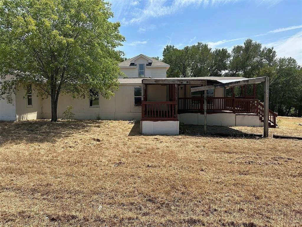 805 Lloyd's Road Little Elm, TX 75068 - Photo 10 of 19 a view of a backyard