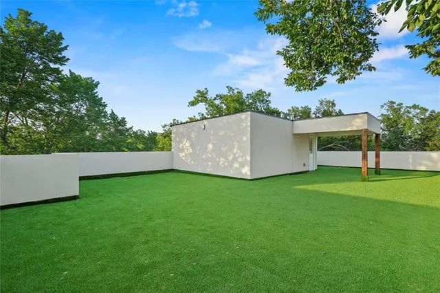 a view of a backyard with a garden