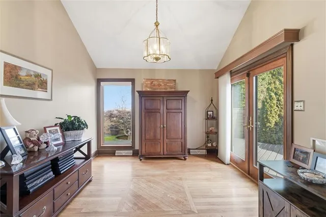 a view of a livingroom with furniture and windows