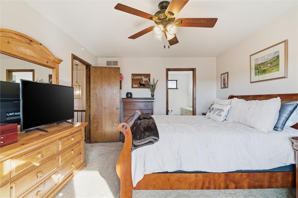 128 Tower Street Monongahela, PA 15063 - Photo 29 of 50 a bedroom with a bed and a flat screen tv