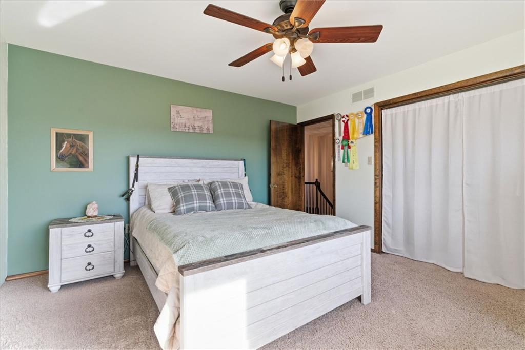 128 Tower Street Monongahela, PA 15063 - Photo 34 of 50 a bedroom with a bed and a chandelier