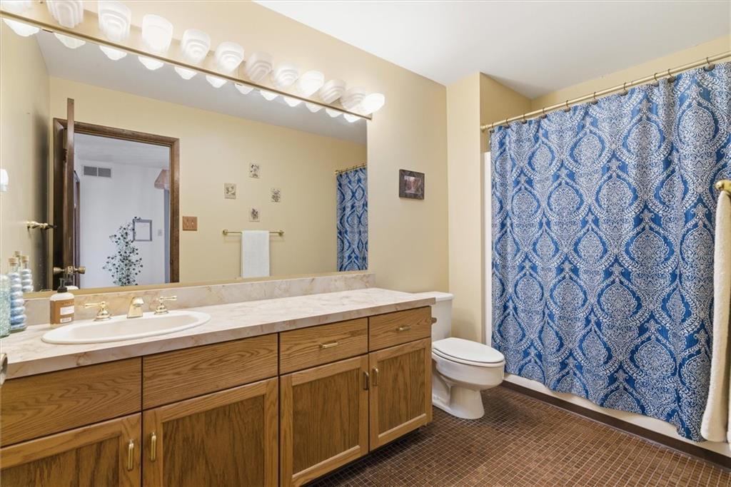 128 Tower Street Monongahela, PA 15063 - Photo 36 of 50 a bathroom with a granite countertop sink and a mirror