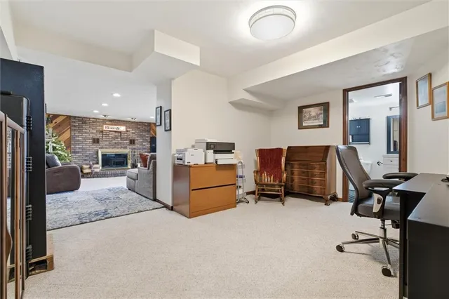 a bathroom with a toilet a sink and a mirror