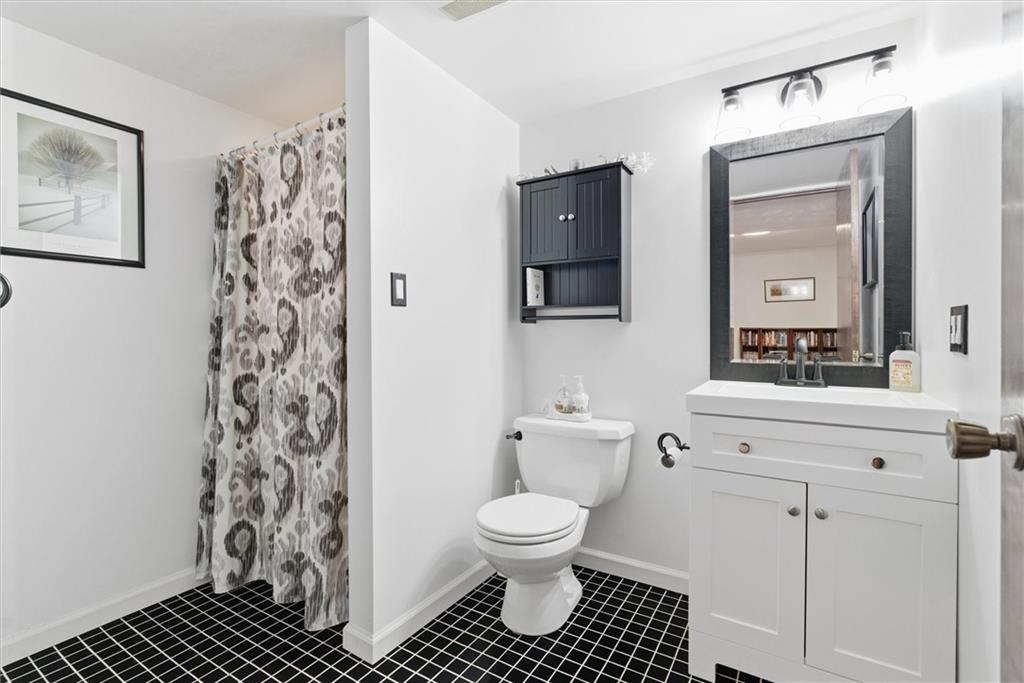 128 Tower Street Monongahela, PA 15063 - Photo 40 of 50 a bathroom with a toilet a sink and a mirror